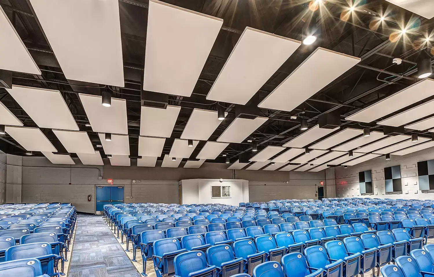 Acoustic reflection clounds on a theater ceiling