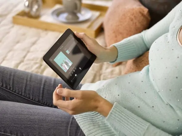 Woman using home automation control