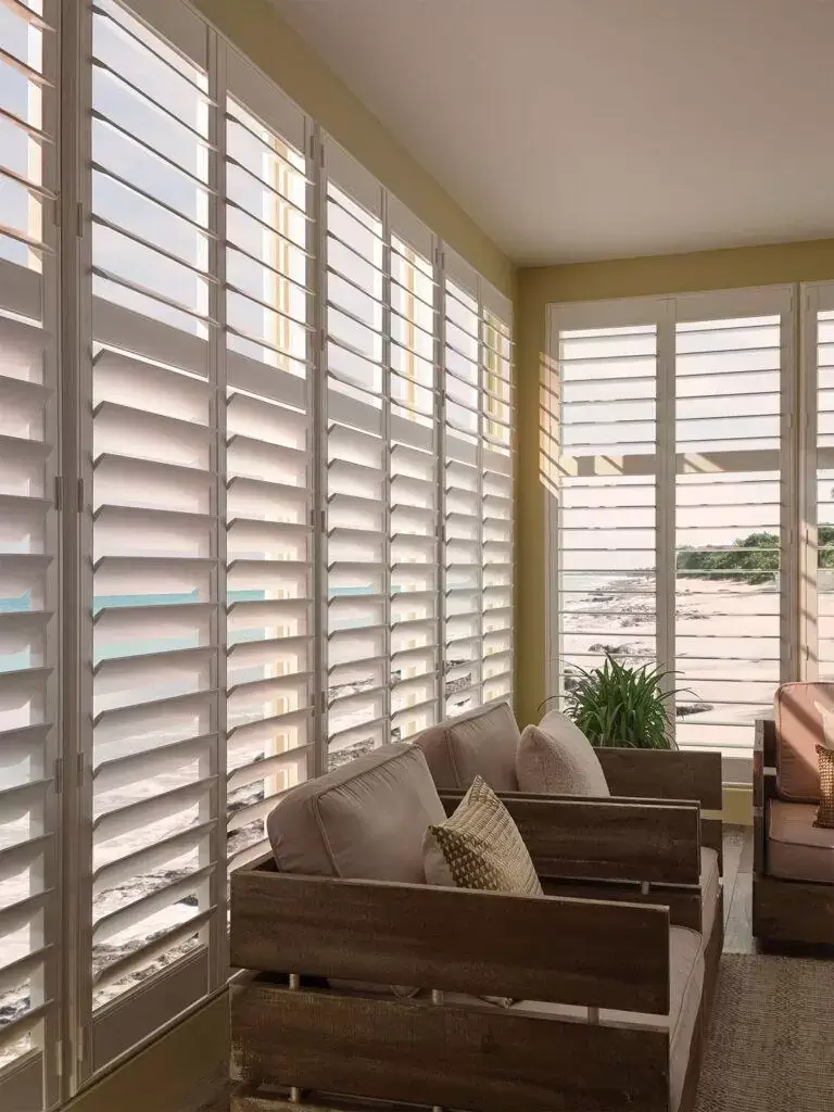 Living room with huge window shutters